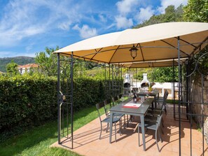 Sky, Cloud, Plant, Furniture, Table, Property, Chair, Umbrella, Outdoor Table, Building