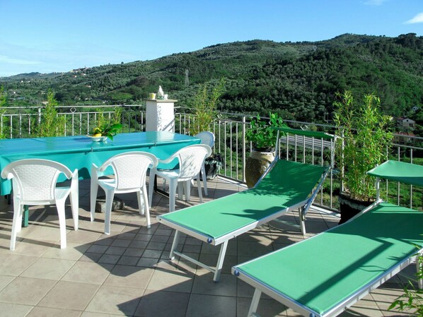 Sky, Property, Green, Nature, Table, Outdoor Furniture, Shade, Mountain, Chair, Outdoor Table