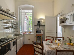 Cabinetry, Furniture, Property, Countertop, Table, Kitchen Appliance, Kitchen Stove, Kitchen, Home Appliance, Sink