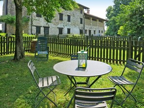 Plant, Furniture, Building, Property, Table, Green, Chair, Nature, Tree, Fence