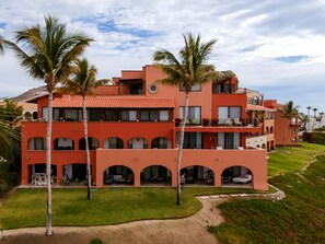 Grassy yard leads direct to the sandy beach.