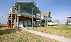 House facing the Gulf Intracoastal Waterway with beach views from the deck.
