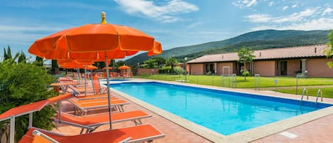 Cloud, Sky, Water, Swimming Pool, Plant, Umbrella, Building, Shade, Outdoor Furniture, Tree