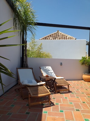Reclining chairs on private roof terrace