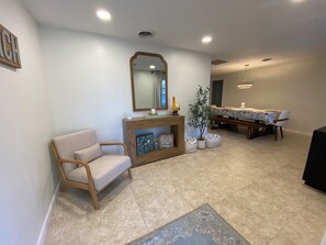 Front entryway with a small threshold to step over for those w/ limited mobility