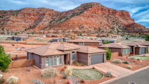 Front of home showing views and dog park.