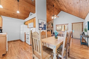 Open floor plan with kitchen, dining and living rooms all connected. Plenty of room to cook together, enjoy a meal or just relax with takeout from one of the great local places.