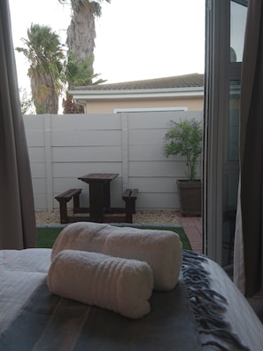 french doors leading onto enclosed courtyard