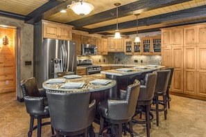 The lower full kitchen is perfect when hosting large groups!