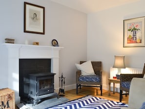 Living room with wood burner | Mid-Lodge - Beaufort Cottages, Beauly, near Inverness