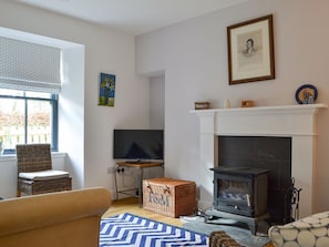 Living room with wood burner | Mid-Lodge - Beaufort Cottages, Beauly, near Inverness
