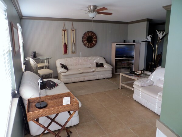 Welcome Home!  Great open floorplan and comfortable leather furniture await!