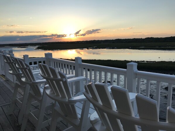 Four comfortable captain's chairs for watching the sunset over the sound