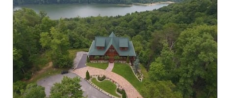 High angle shot of property and lake view