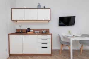 Kitchenette with a kettle.