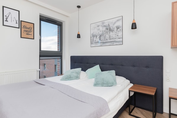 Living area with double bed.