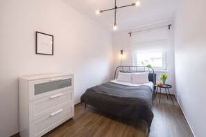Comfortable double bed in the bedroom. 