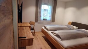 Ferienhaus "Naturverbunden" 5* DTV-Schlafzimmer 1 - Ferienhaus