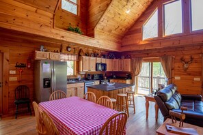 Full kitchen with dining room table...