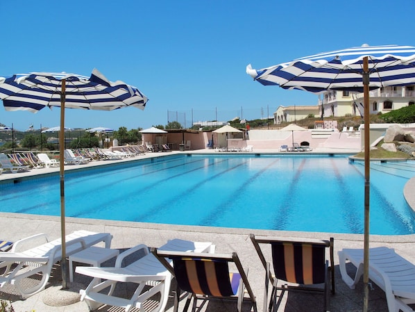 Water, Sky, Furniture, Property, Swimming Pool, Building, Chair, Azure, Shade, Outdoor Furniture