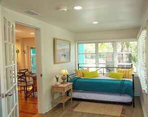 Sunroom - A twin-size day bed, plus a trundle bed which can be pulled out. Loved by kids and kids at heart.
