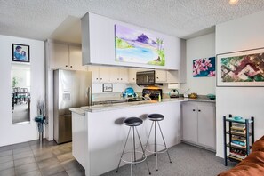 Kitchen with seating for 2 at the breakfast bar