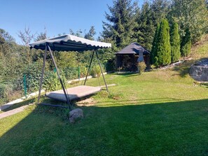 Garden, Outdoor Furniture, Lawn, Shade, Backyard, Outdoor Structure, Yard, Landscaping, Canopy