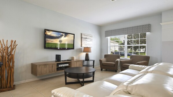 Chill movie nights or game nights with friends? This living room has you covered! Big screen, comfy couches!
