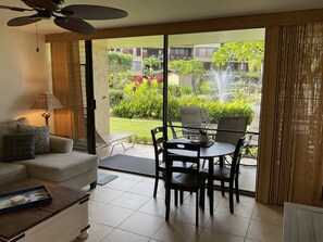 Living area and walk out to koi pond.