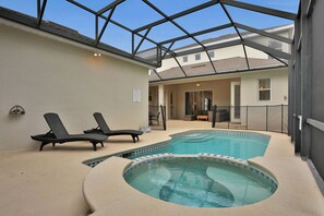 Cool off in the screened-in pool