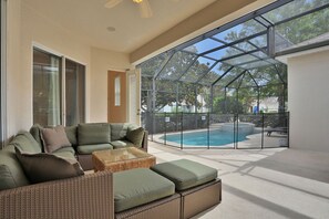 Relax by the pool in the comfortable lounge seating