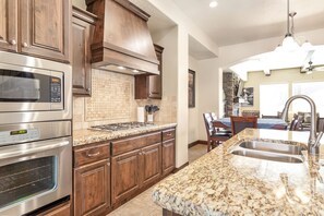 Fully stocked gourmet Kitchen featuring top of the line appliances
