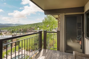 Watch skiers go by in the winter and bikers in the summer as you unwind on your private balcony.