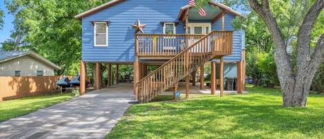 Plenty of parking in the front of the home and on the right side underneath the home