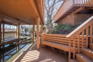 Sit down and relax down by the boat dock with the built in bench.