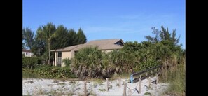 Steps to private sandy beach with gorgeous seashells.