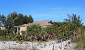 Steps to private sandy beach with gorgeous seashells.