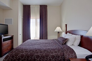 Drift to sleep in this plush bed.