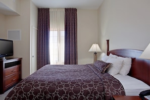 Drift to sleep in this plush bed.