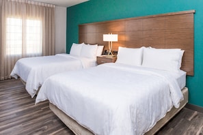 Drift to sleep in a plush bed.