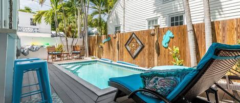 Ample outdoor seating allows you to lounge around the pool and savor the wonderful weather of the Florida Keys to the fullest.