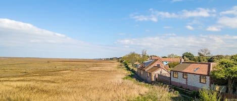 Exterior: Marsh Retreat sits right on The Norfolk Coast Path