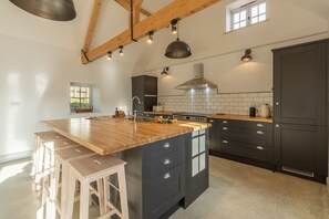 Ground floor: Spacious kitchen with central island