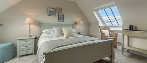 3 Knights Cottages: Master bedroom with coastal views