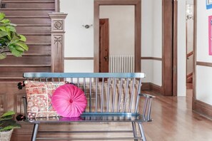 Bench in the foyer so that you can kick off your shoes and get comfortable