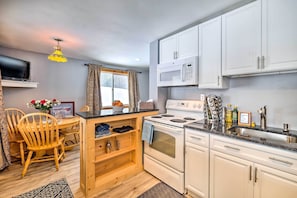 Cook your favorite meals in this condo.