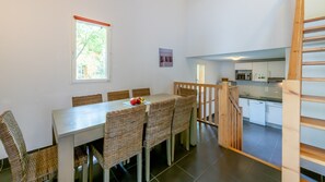 Share meals and laughs at the dining table.