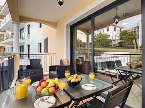 Aparmtent's spacious balcony #breakfast #outdoorfurniture #poolviewfrombalcony