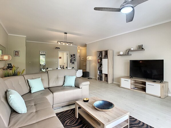 Inviting contemporary living with Smart TV #livingroom # sofa #spacious #luxury