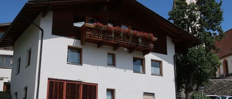 Sky, Plant, Building, Window, Property, Wheel, Door, House, Tree